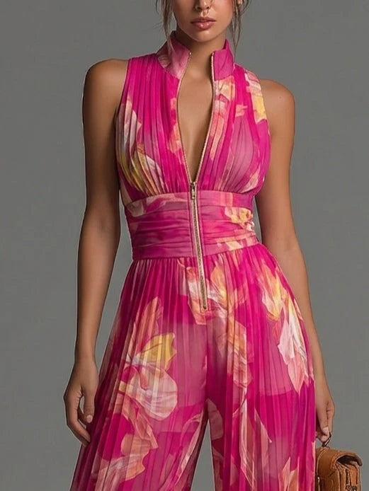 Tuta Fucsia Smanicata in Chiffon con Stampa Floreale, Pantaloni Plissettati a Gamba Larga e Chiusura con Cerniera